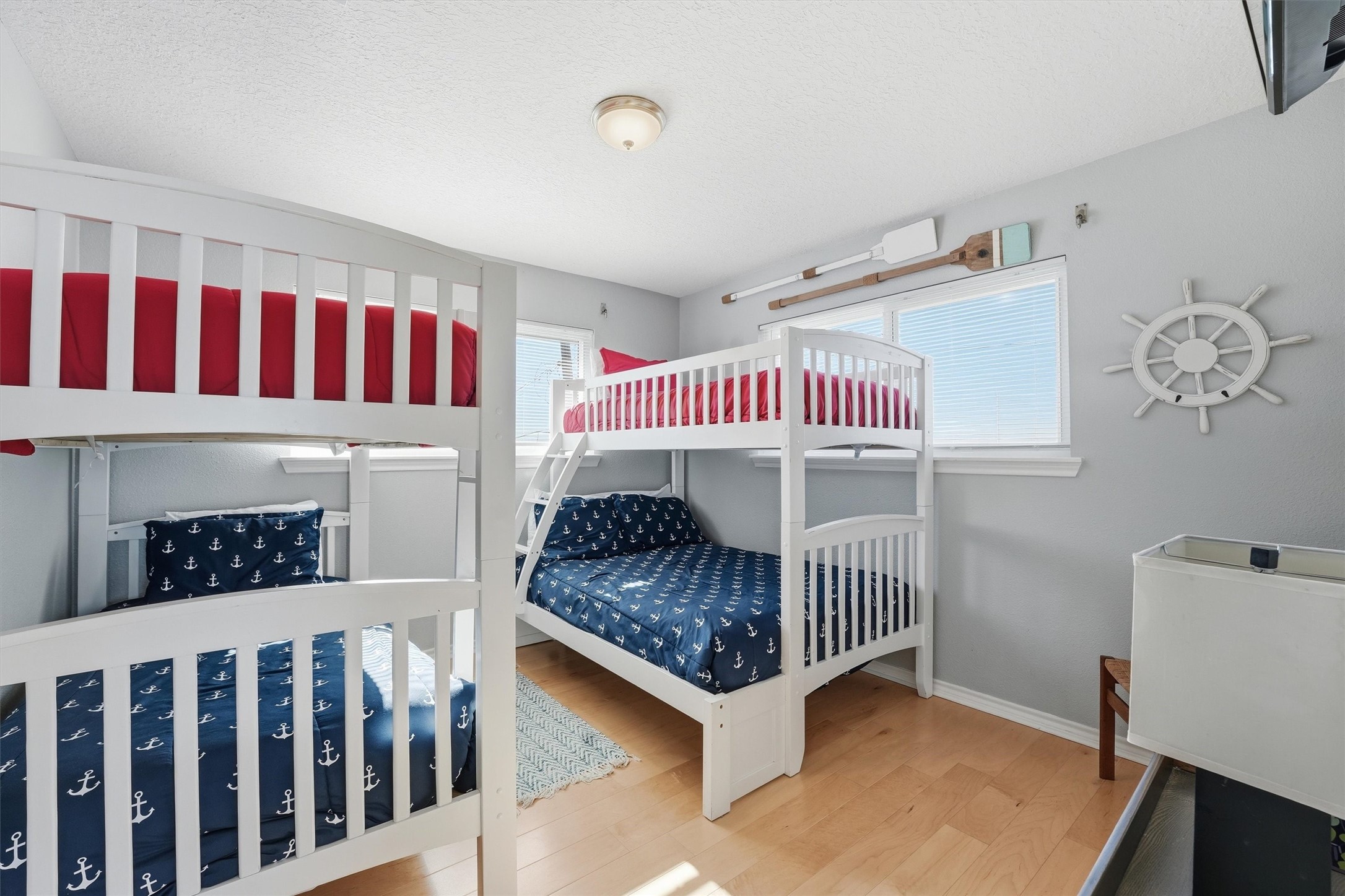 12902 John Reynolds Road Galveston, TX 77554 - Photo 15 of 22 a bedroom with a bed and a window