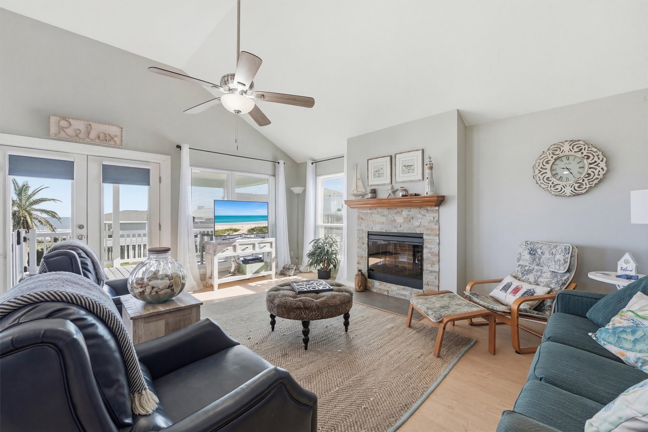 12902 John Reynolds Road Galveston, TX 77554 - Photo 4 of 22 a living room with furniture and a fireplace
