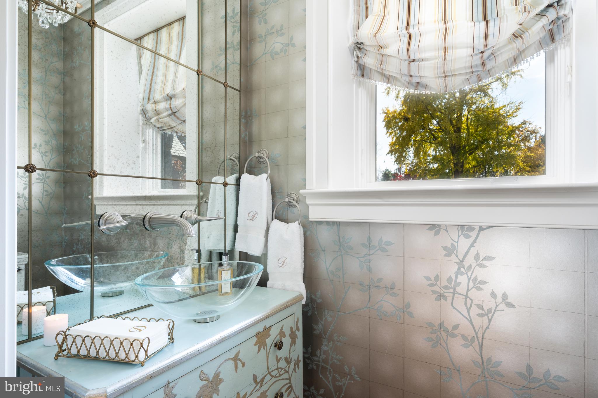 3031 Gates Road Northwest Washington, DC 20008 - Photo 23 of 50 a bathroom with a granite countertop sink a mirror and a shower