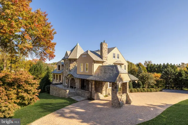 a front view of a house with swimming pool