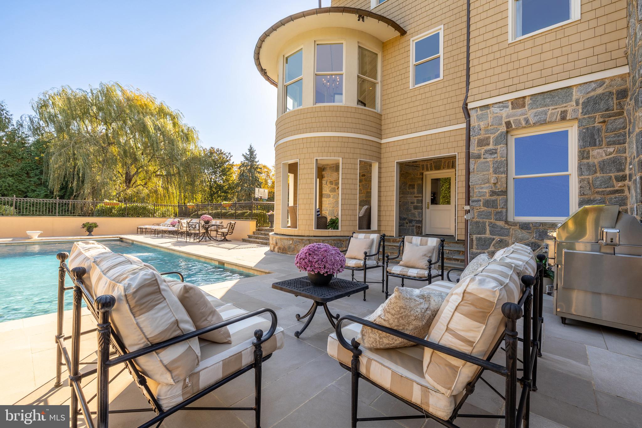 3031 Gates Road Northwest Washington, DC 20008 - Photo 47 of 50 a swimming pool with outdoor seating and yard