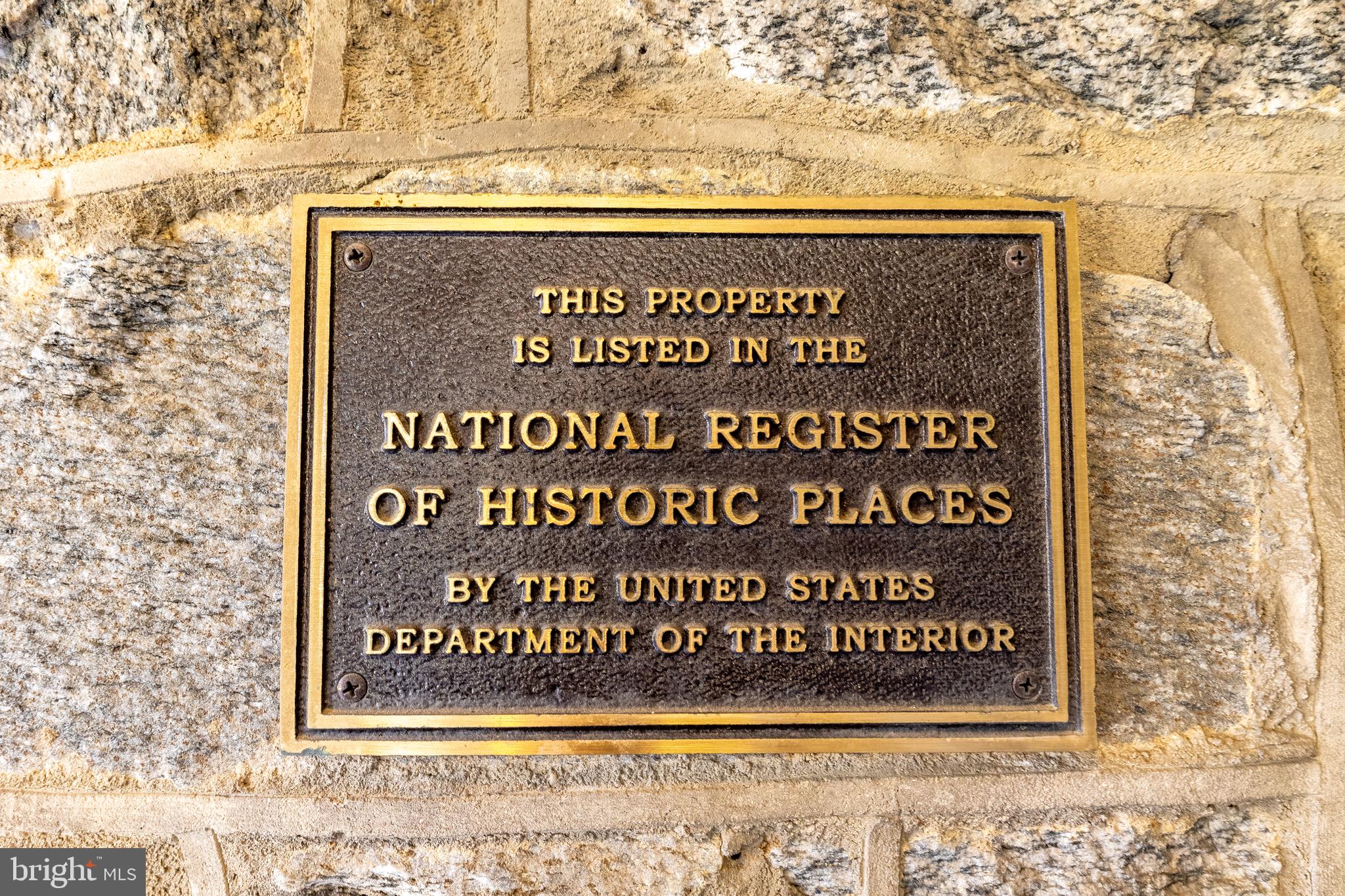 3031 Gates Road Northwest Washington, DC 20008 - Photo 6 of 50 a sign on the side of a building