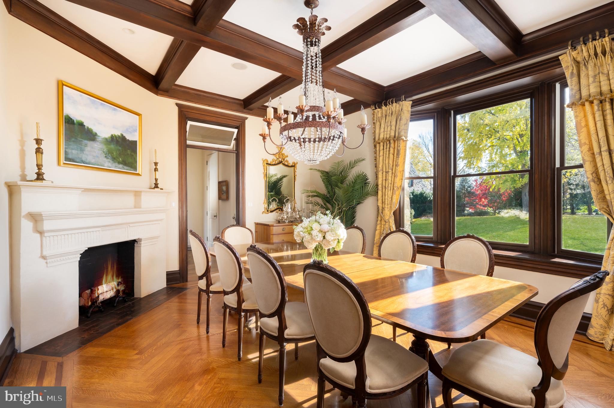 3031 Gates Road Northwest Washington, DC 20008 - Photo 9 of 50 a dining room with furniture a fireplace and a chandelier