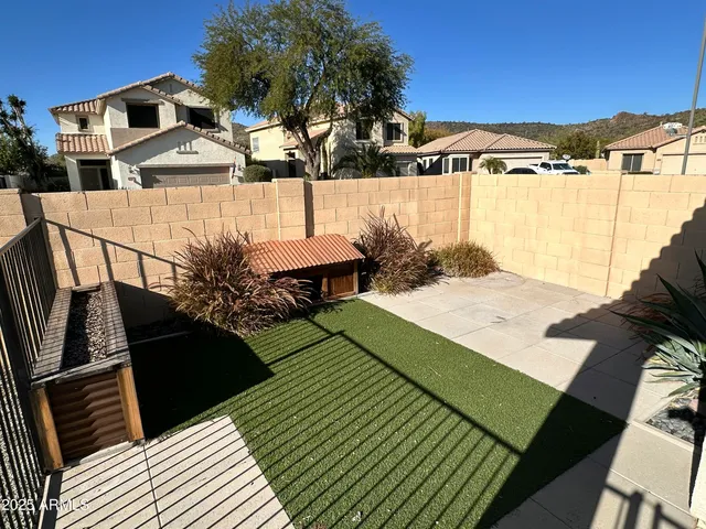 a view of a terrace with sitting area