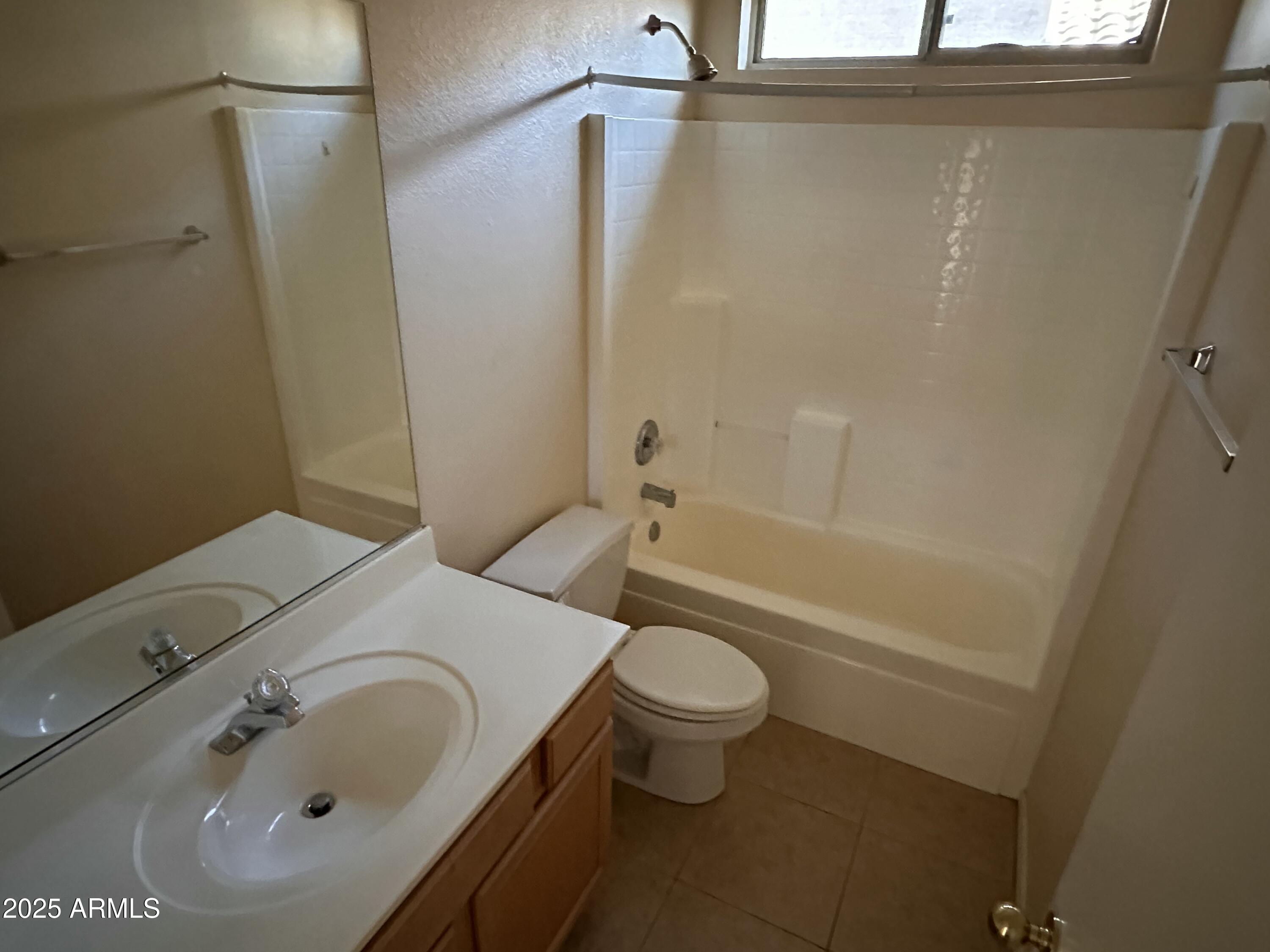 25412 North 40th Lane Phoenix, AZ 85083 - Photo 10 of 19 a bathroom with a sink a toilet and shower