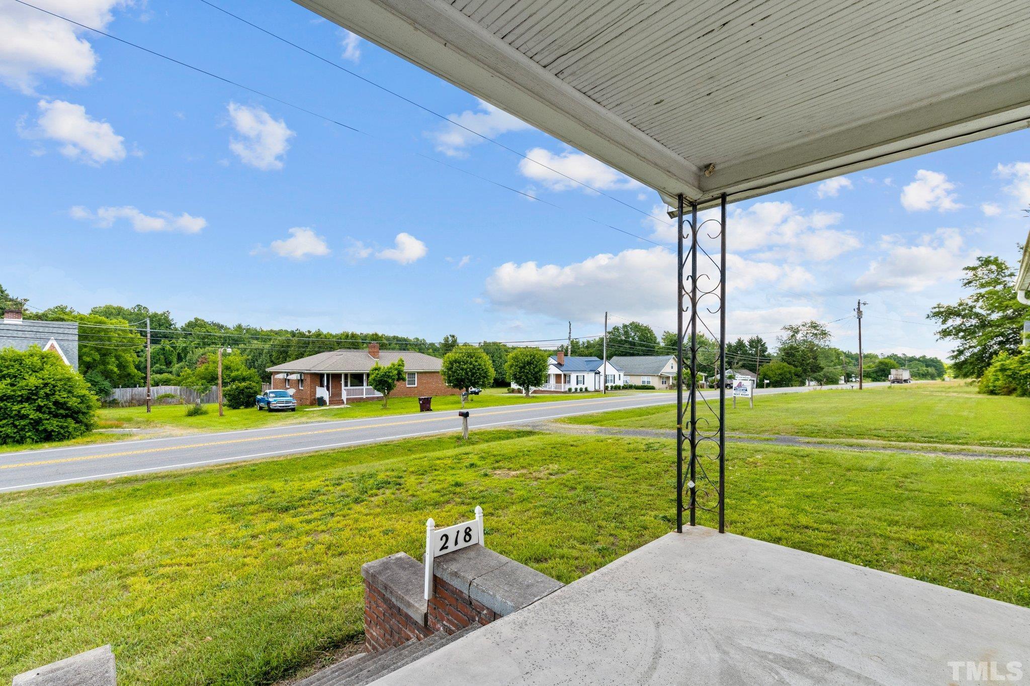 218 Oxford Road Roxboro, NC 27573 - Photo 14 of 16 a view of a garden with a slide