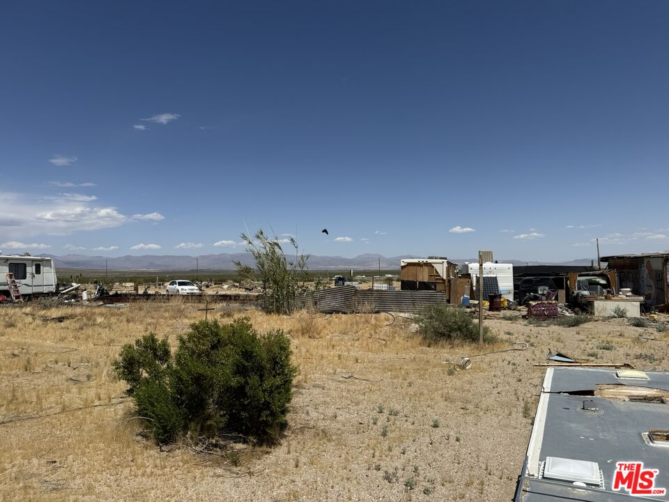 401 Sterling Road Inyokern, CA 93527 - Photo 32 of 37 a view of a living room and a fireplace
