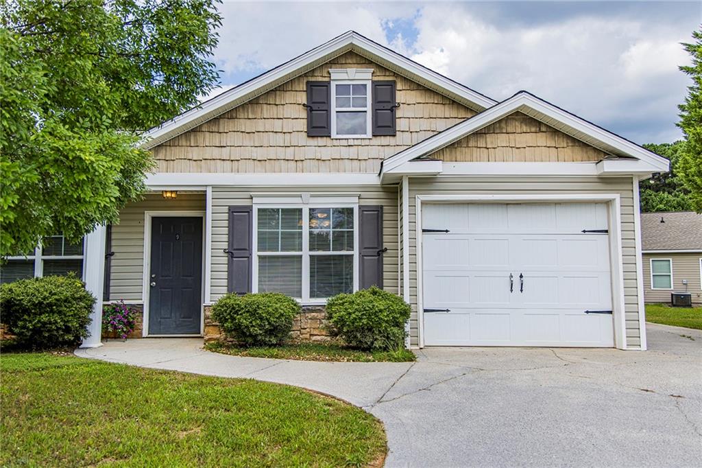 a view of backyard of house garage