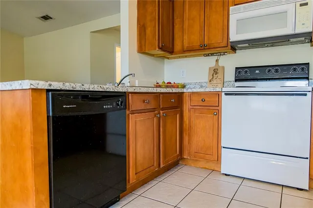 a kitchen with a sink and a window