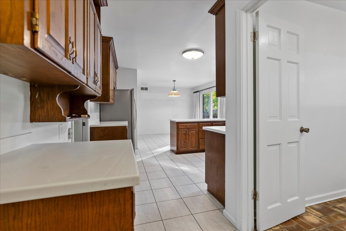 1107 Pine Ridge Court Normal, IL 61761 - Photo 16 of 50 a view of a kitchen from the hallway