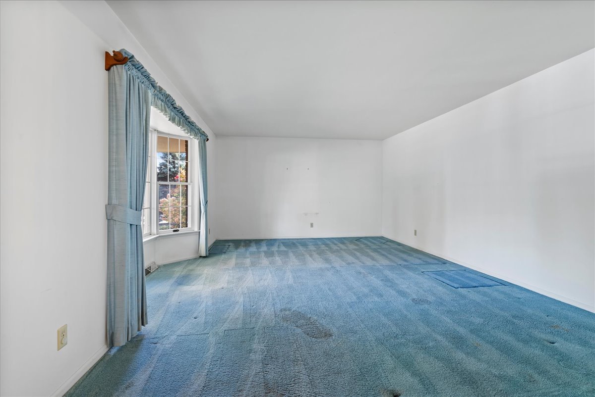 1107 Pine Ridge Court Normal, IL 61761 - Photo 20 of 50 an empty room with wooden floor and windows