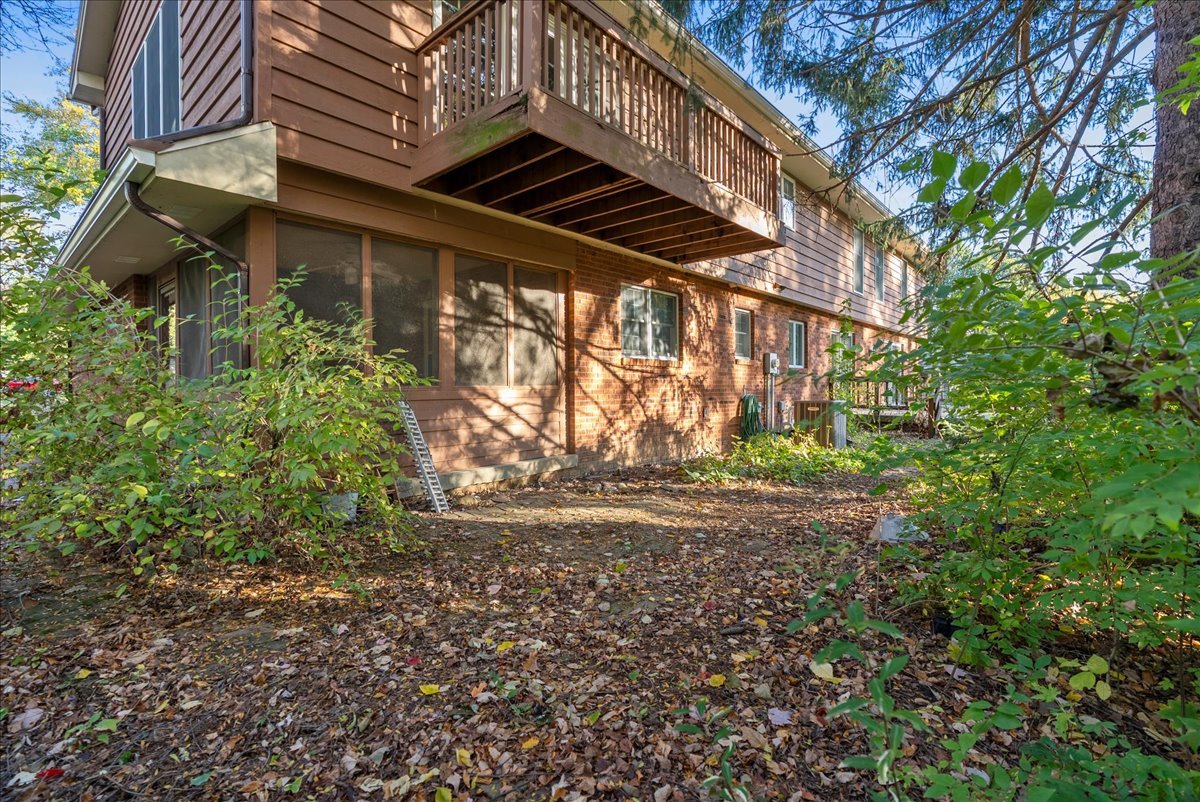 1107 Pine Ridge Court Normal, IL 61761 - Photo 42 of 50 a pathway of a house with a yard