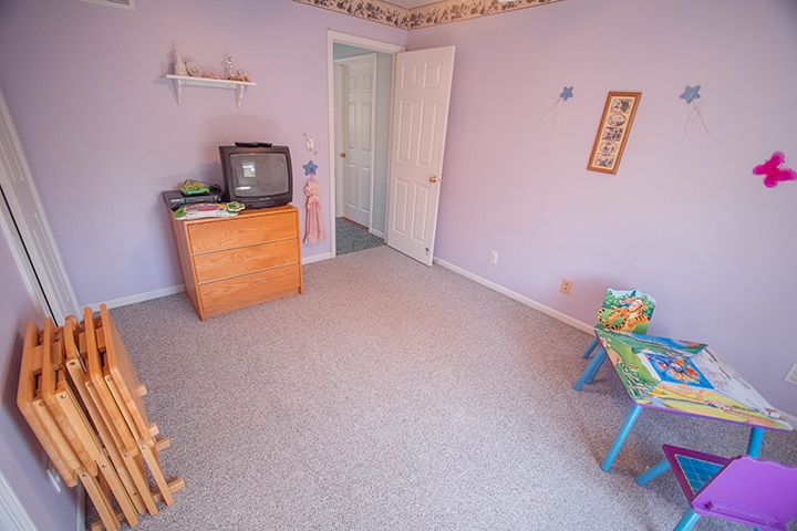 110 Pembroke Road Southwest Poplar Grove, IL 61065 - Photo 15 of 25 a room with toys and wooden floor