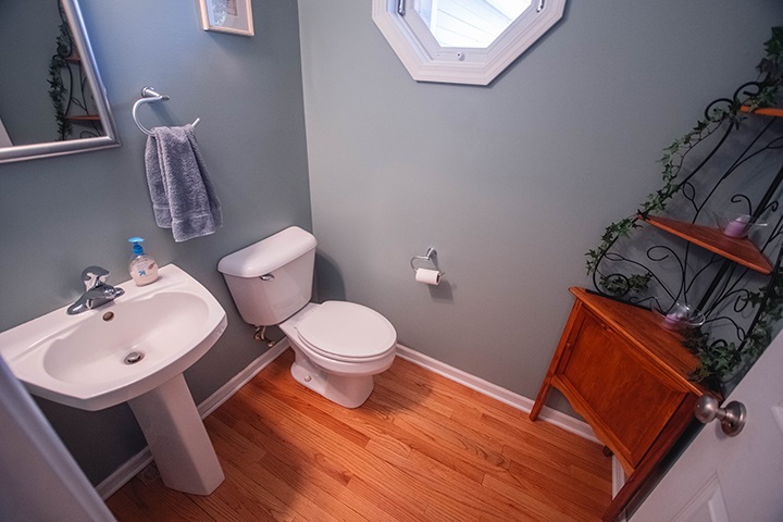 110 Pembroke Road Southwest Poplar Grove, IL 61065 - Photo 16 of 25 a bathroom with a sink mirror and toilet