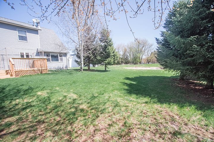 110 Pembroke Road Southwest Poplar Grove, IL 61065 - Photo 25 of 25 a view of a house with a yard