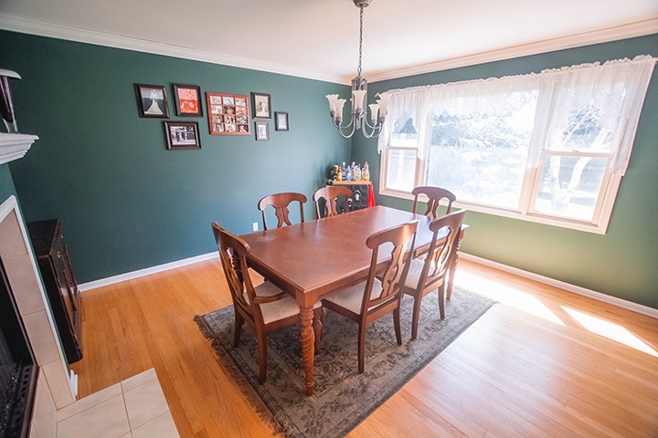 110 Pembroke Road Southwest Poplar Grove, IL 61065 - Photo 7 of 25 a view of a dining room with furniture window and wooden floor