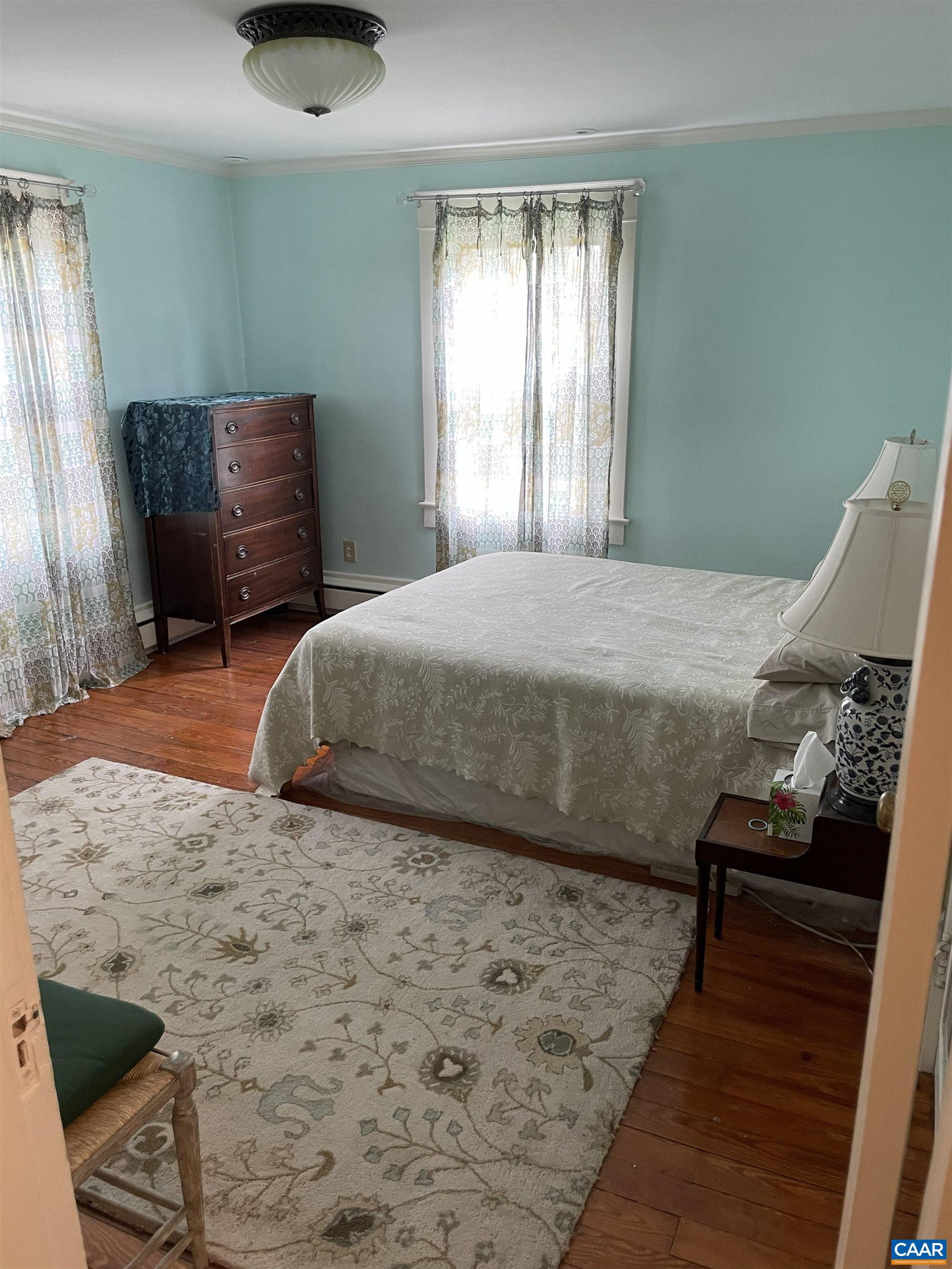 954 Old Lynchburg Road, Unit A Charlottesville, VA 22903 - Photo 14 of 44 a bedroom with a bed and window