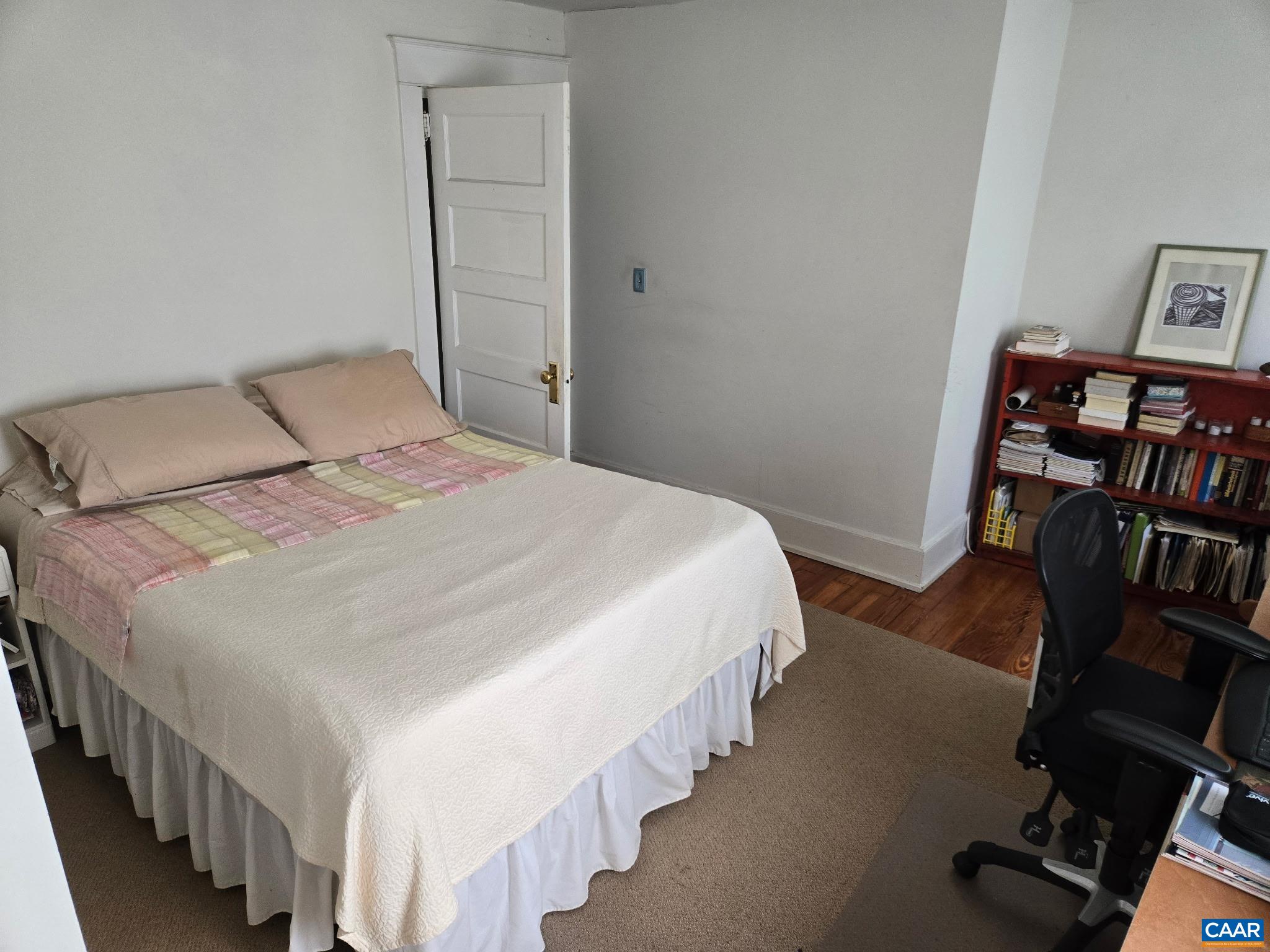 954 Old Lynchburg Road, Unit A Charlottesville, VA 22903 - Photo 16 of 44 a bedroom with bed and wooden floor