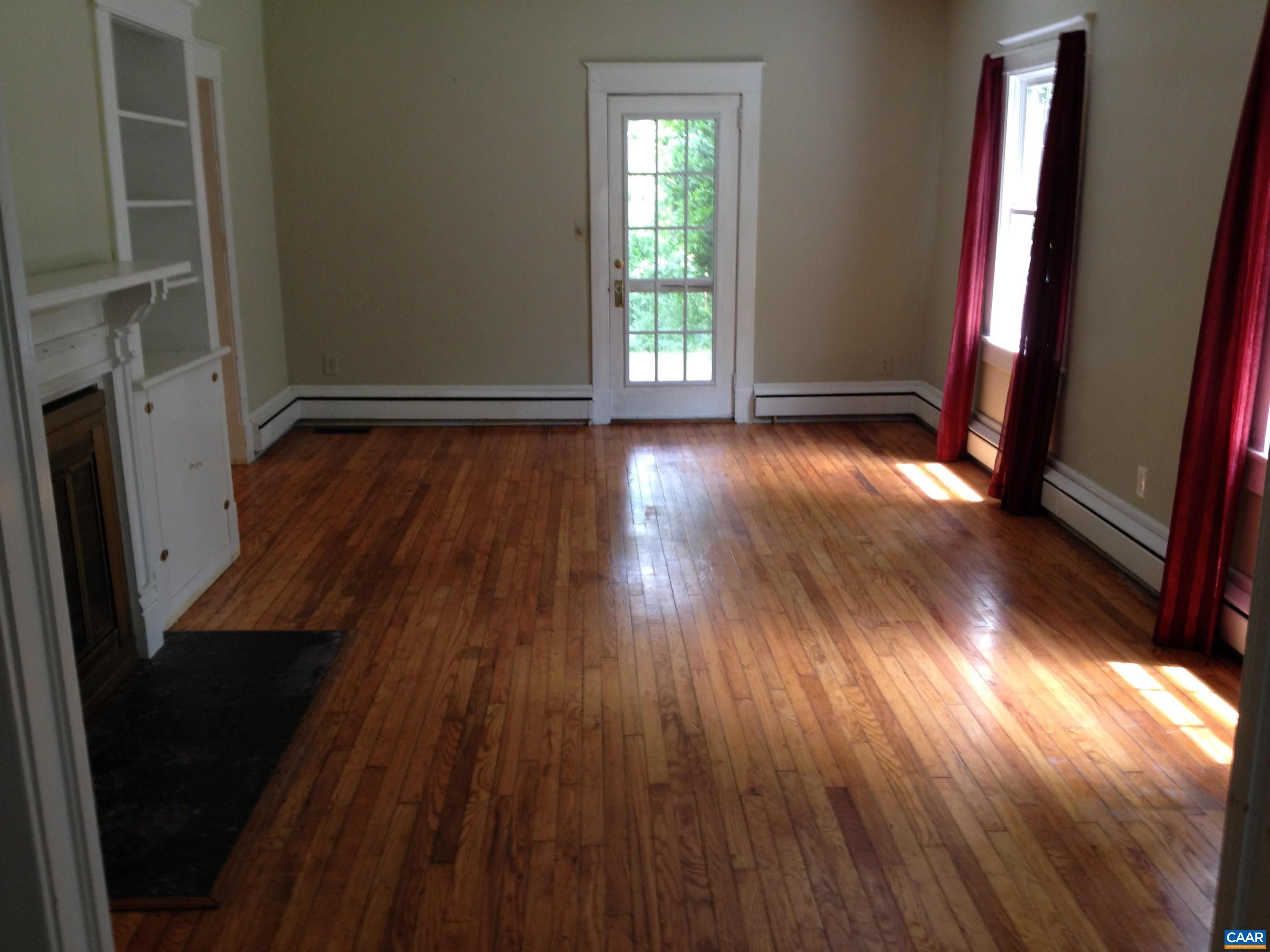 954 Old Lynchburg Road, Unit A Charlottesville, VA 22903 - Photo 17 of 44 wooden floor in an empty room with a window