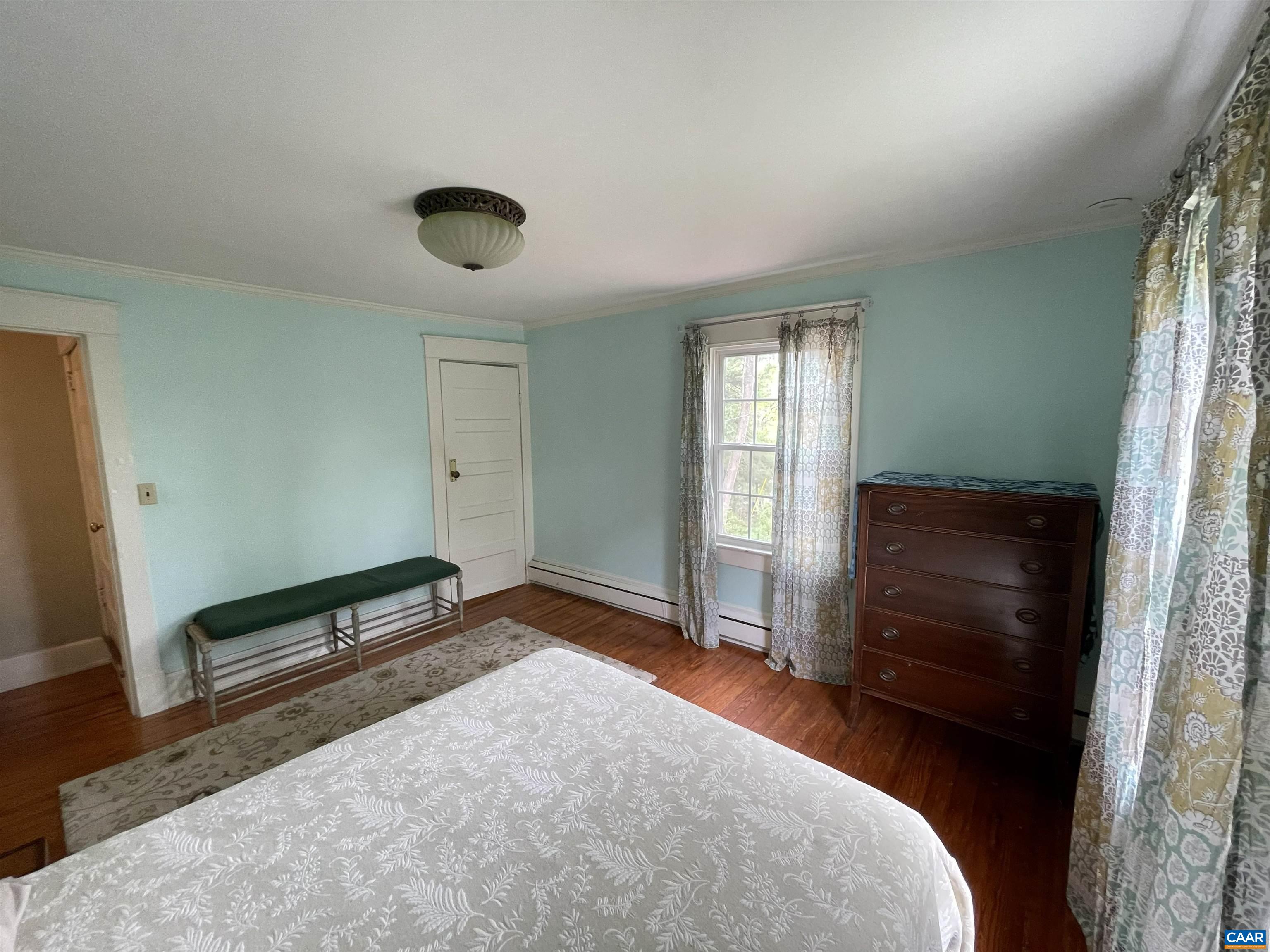 954 Old Lynchburg Road, Unit A Charlottesville, VA 22903 - Photo 44 of 44 wooden floor and window in a room