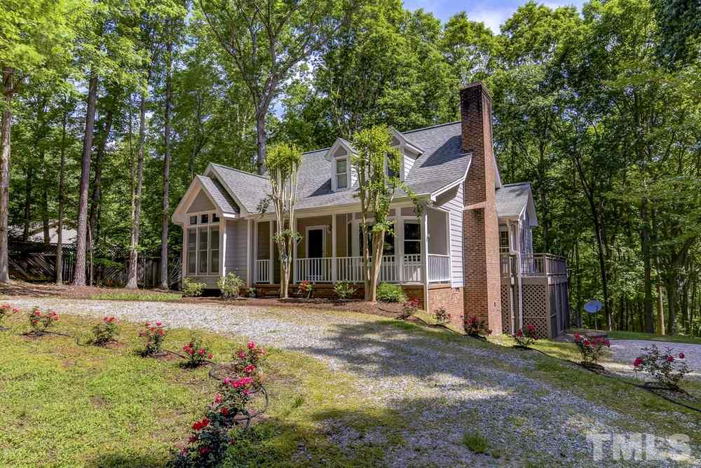 5612 Purnell Road Wake Forest, NC 27587 - Photo 1 of 23 a front view of a house with a yard