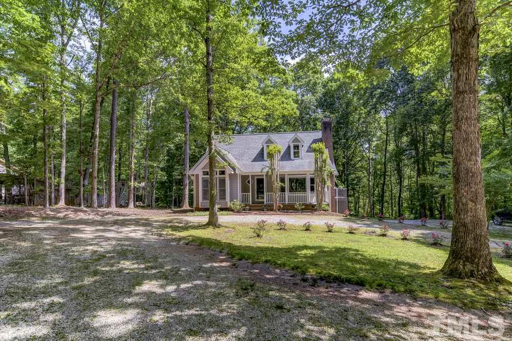 5612 Purnell Road Wake Forest, NC 27587 - Photo 2 of 23 a front view of a house with a yard