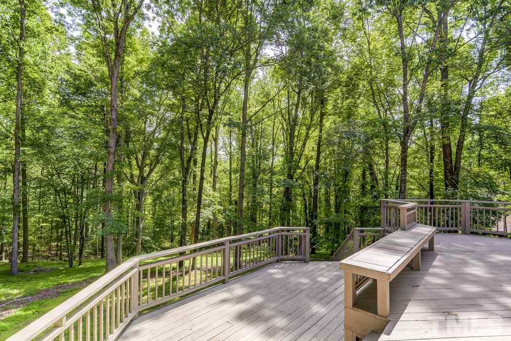 5612 Purnell Road Wake Forest, NC 27587 - Photo 20 of 23 a view of a two chair and table in the balcony