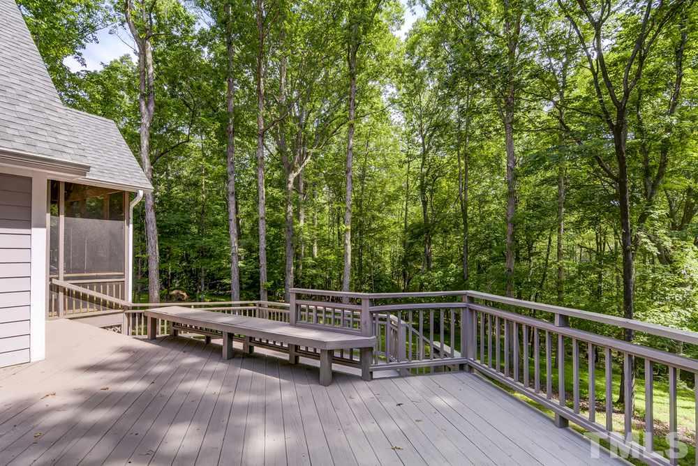 5612 Purnell Road Wake Forest, NC 27587 - Photo 21 of 23 a view of backyard with deck and trees