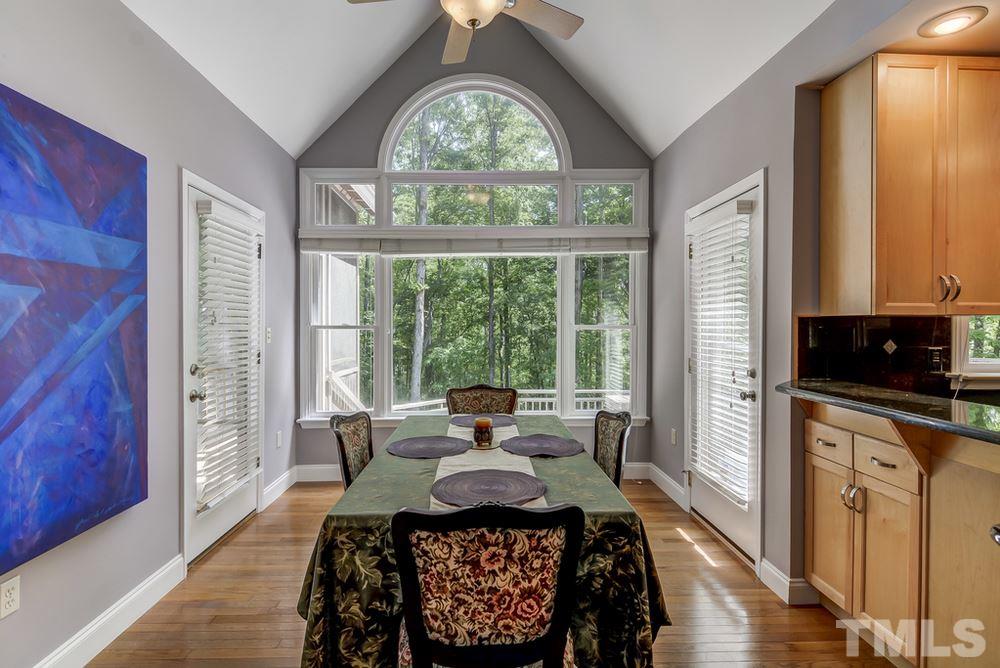 5612 Purnell Road Wake Forest, NC 27587 - Photo 4 of 23 a living room with furniture and a large window