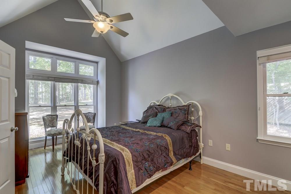 5612 Purnell Road Wake Forest, NC 27587 - Photo 8 of 23 a bed sitting in a bedroom next to a window