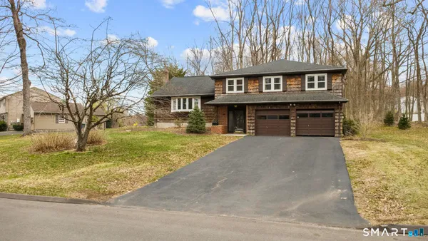 front view of a residential houses with yard