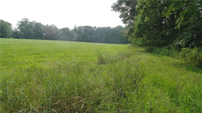 --- Pink Road Slippery Rock, PA 16057 - Photo 2 of 7 a view of field with trees in the background