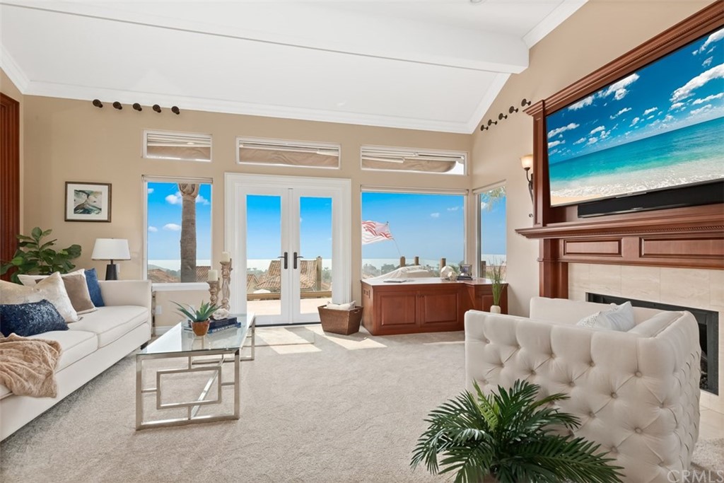 17 St Francis Court Dana Point, CA 92629 - Photo 21 of 66 a living room with furniture and a flat screen tv