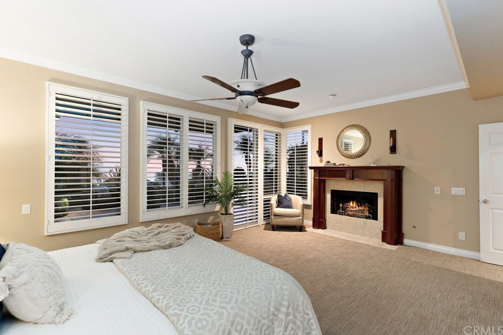 17 St Francis Court Dana Point, CA 92629 - Photo 39 of 66 a bedroom with a large bed and a large window