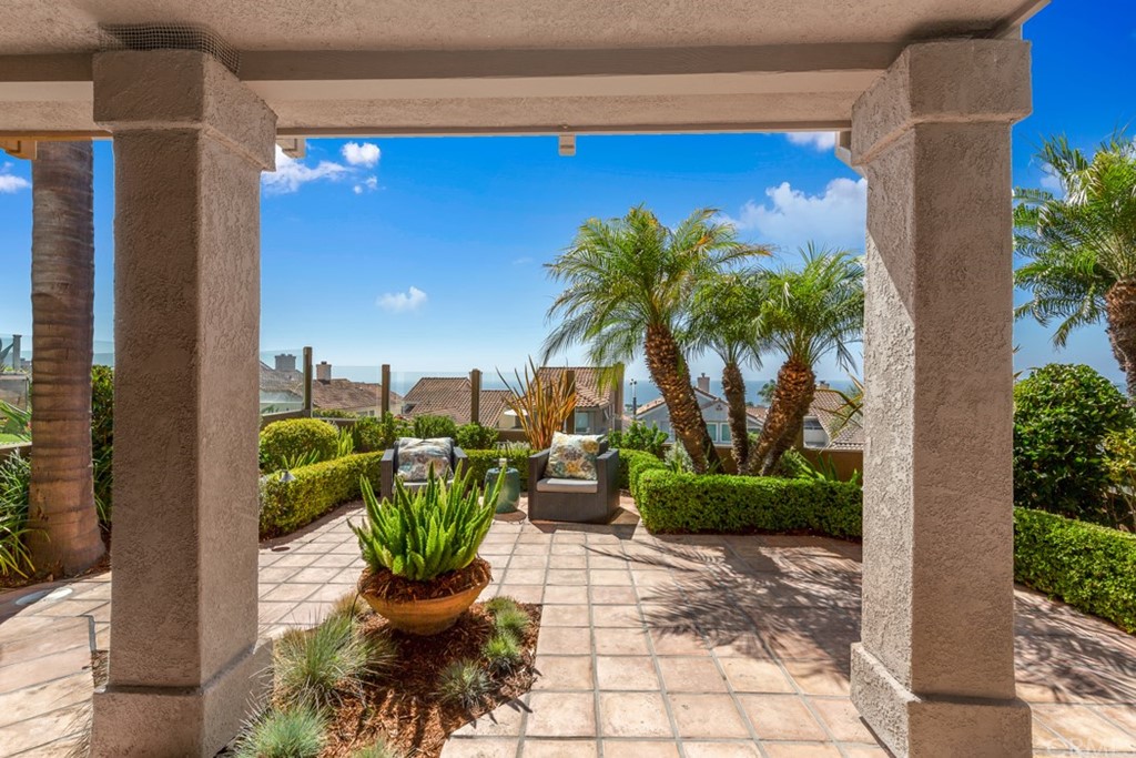 17 St Francis Court Dana Point, CA 92629 - Photo 48 of 66 a view of a terrace with chairs and potted plants