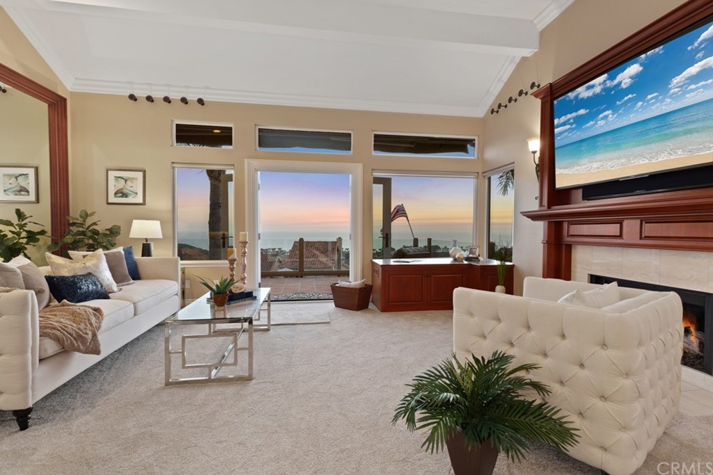 17 St Francis Court Dana Point, CA 92629 - Photo 6 of 66 a living room with furniture and a flat screen tv