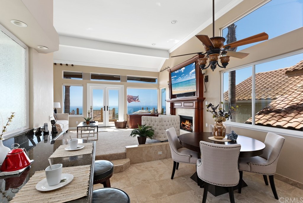 17 St Francis Court Dana Point, CA 92629 - Photo 8 of 66 a living room with furniture a window and a ceiling fan