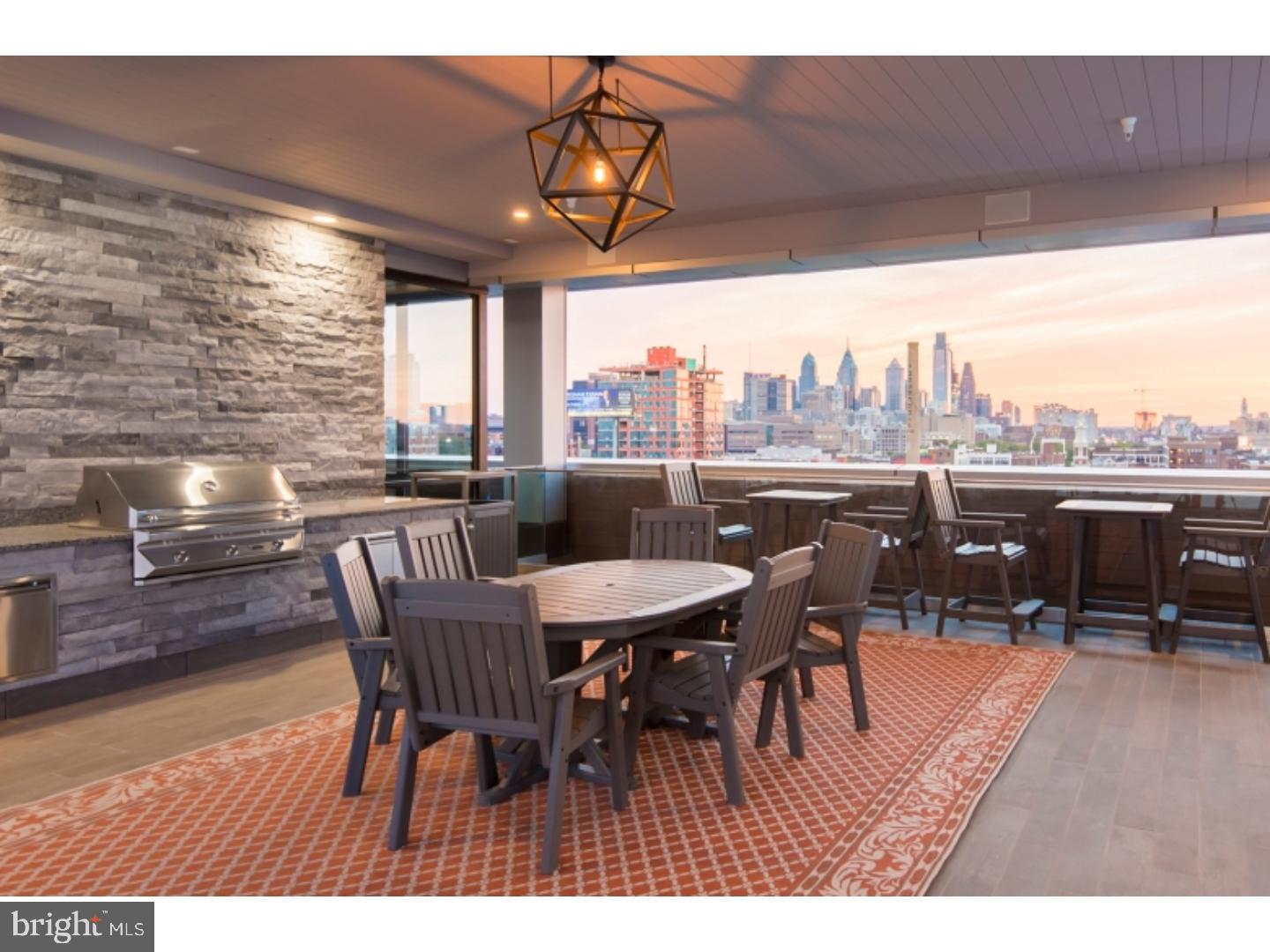 235 North Christopher Columbus Boulevard, Unit 305 Philadelphia, PA 19106 - Photo 7 of 55 a view of a dining room with furniture window and outside view