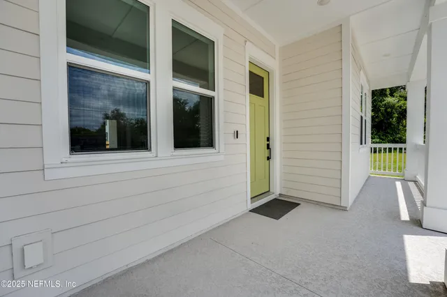 a big room with stainless steel appliances kitchen island a large counter top and a stove top oven