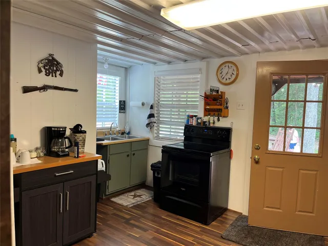 a bedroom with furniture and window