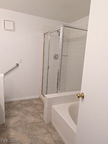 2201 Ramsgate Drive, Unit 116 Henderson, NV 89074 - Photo 12 of 13 This bathroom features a shower and a tub, providing comfort and convenience.