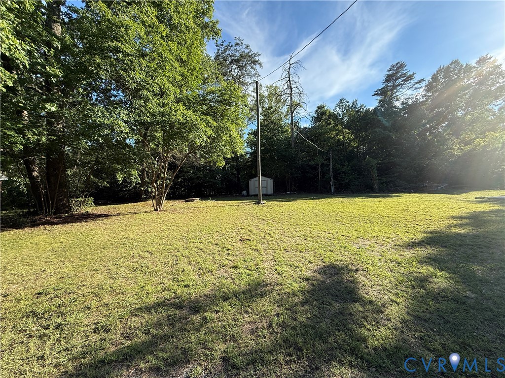 88 Seahawk Road Urbanna, VA 23175 - Photo 10 of 16 Expansive outdoor space featuring a generous lawn,