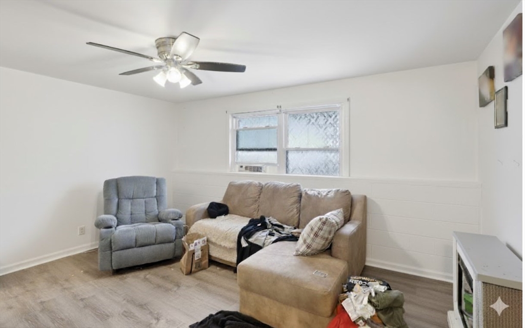 352 Vale Street, Unit 1 Fall River, MA 02724 - Photo 5 of 12 a living room with furniture and a window