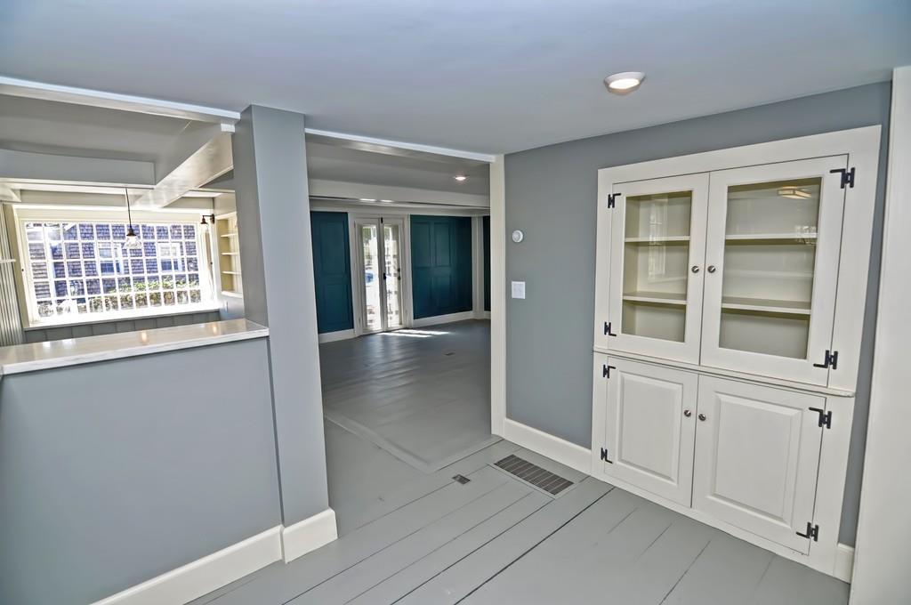 1874 Main Road Westport, MA 02791 - Photo 11 of 28 wooden floor with windows and entrance