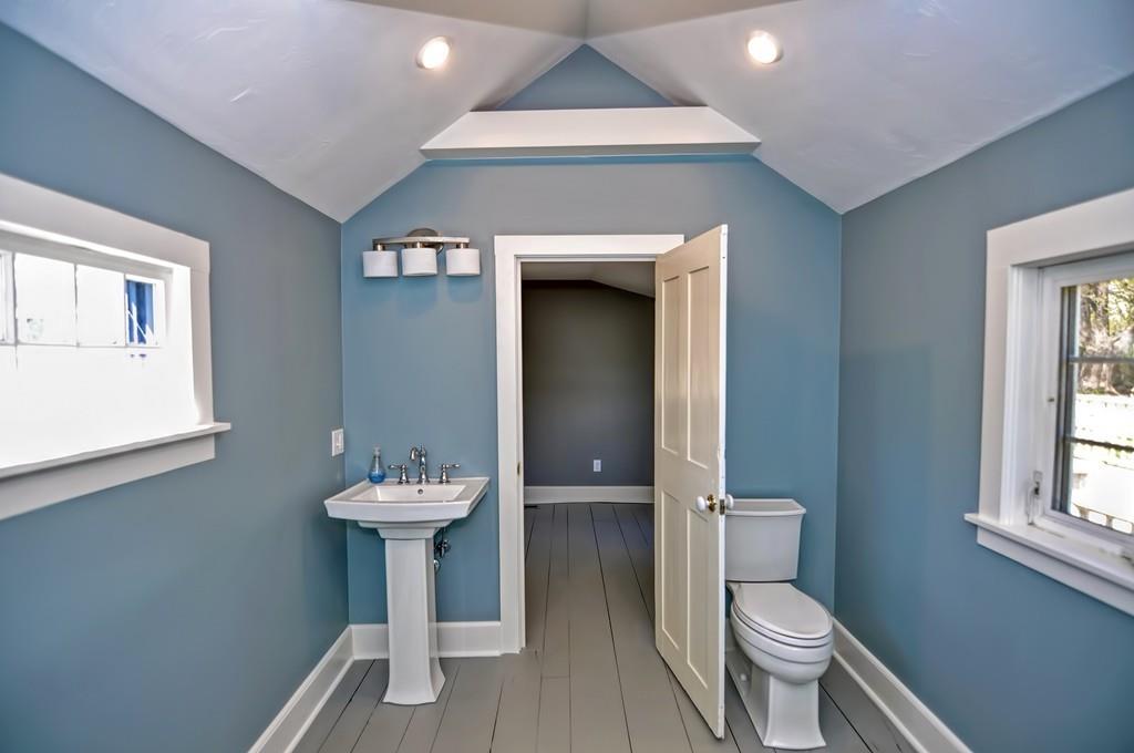 1874 Main Road Westport, MA 02791 - Photo 16 of 28 a bathroom with a sink toilet and a mirror