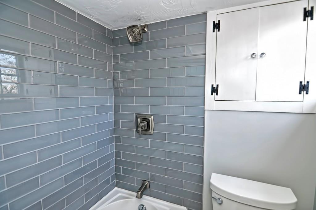 1874 Main Road Westport, MA 02791 - Photo 25 of 28 a bathroom with a toilet and a shower