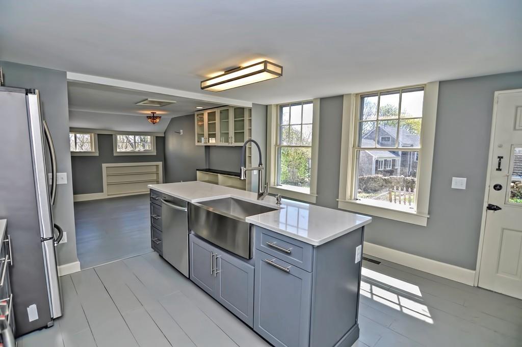 1874 Main Road Westport, MA 02791 - Photo 5 of 28 a kitchen with stainless steel appliances granite countertop a sink and a stove