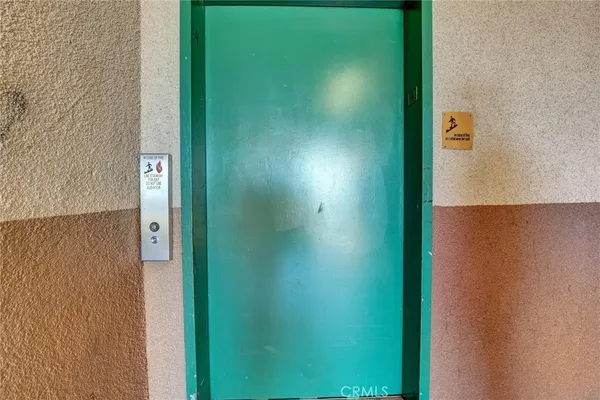 a kitchen with cabinets and washer