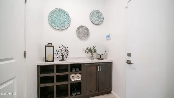 a view of a hallway with washer and dryer