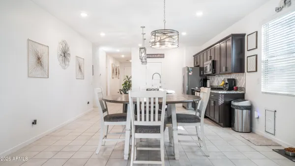 a view of a dining room with furniture